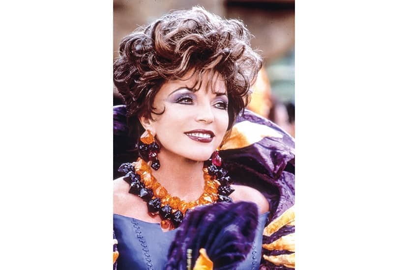 joan collins purple dress Joan Collins Queen Rat Editorial Stock Photo - Stock Image