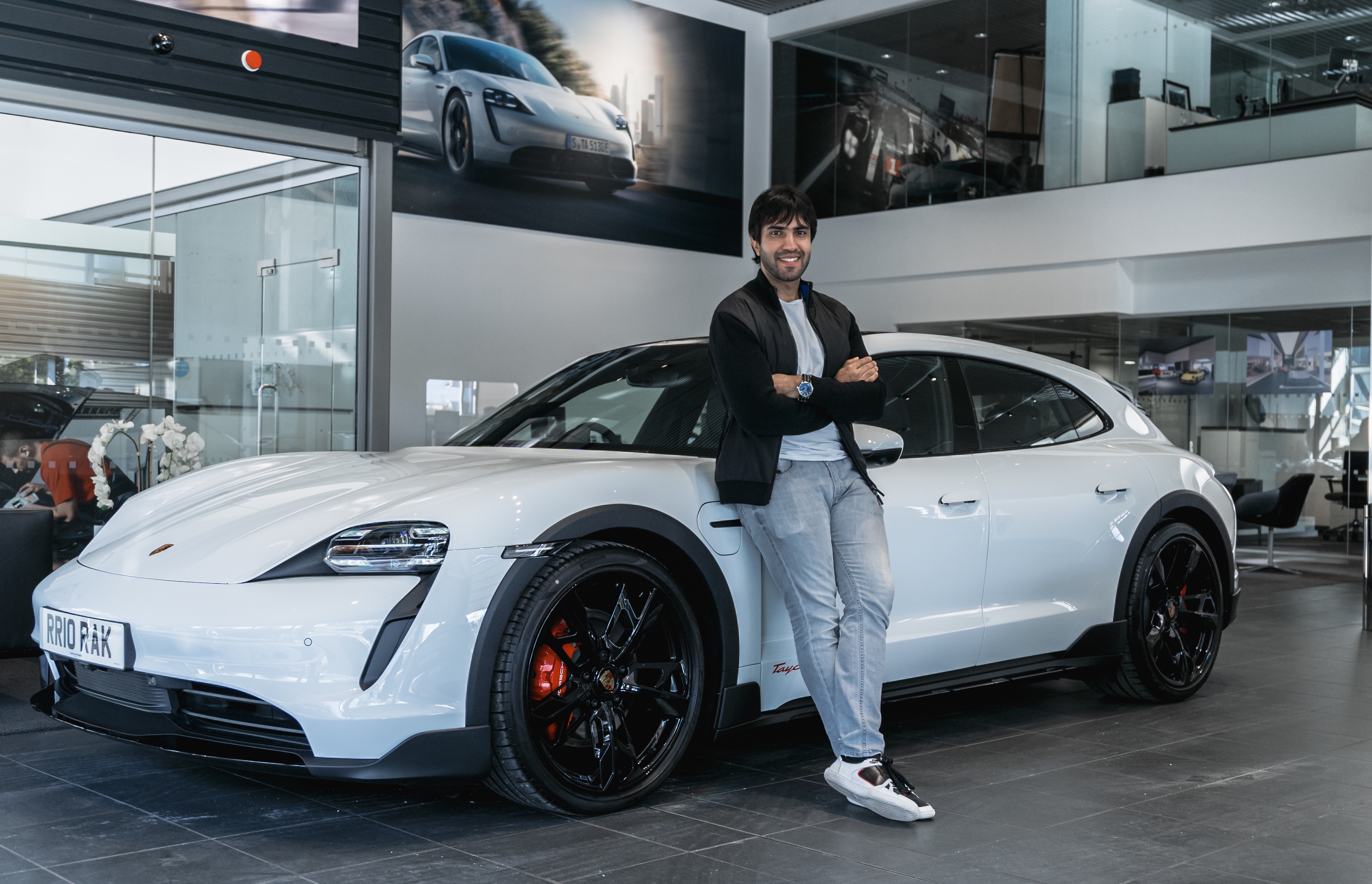 Razis_Rehan_and_his_Porsche_Taycan_Cross_Turismo.jpg