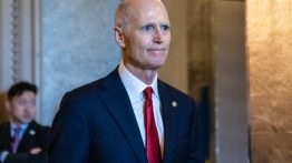 Sen. Rick Scott (R-FL) departs the Senate floor (Getty Images)