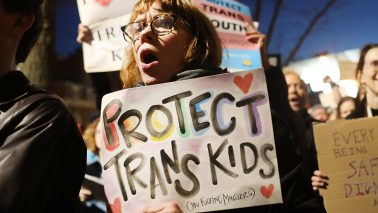 LGBT activists gather outside the Stonewall Inn (Photo by Spencer Platt/Getty Images)