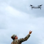 ARLINGTON, VA - JUNE 14: A soldier prepares to catch a drone in the Pentagon parking lot on June 14, 2025 in Arlington, Virginia. The U.S. Army is marking its 250th anniversary with a military parade along Constitution Avenue that includes roughly 6,600 troops, 150 vehicles, and over 50 aircraft. The parade, which coincides with President Donald Trump's 79th birthday, is designed to tell the history of the Army. (Photo by Samuel Corum/Getty Images)