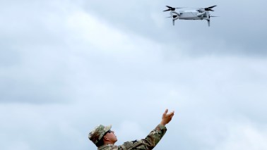 ARLINGTON, VA - JUNE 14: A soldier prepares to catch a drone in the Pentagon parking lot on June 14, 2025 in Arlington, Virginia. The U.S. Army is marking its 250th anniversary with a military parade along Constitution Avenue that includes roughly 6,600 troops, 150 vehicles, and over 50 aircraft. The parade, which coincides with President Donald Trump's 79th birthday, is designed to tell the history of the Army. (Photo by Samuel Corum/Getty Images)