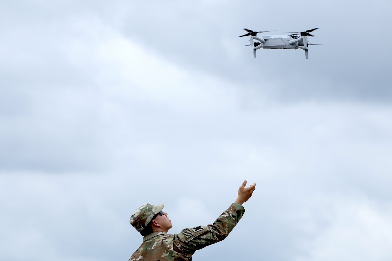ARLINGTON, VA - JUNE 14: A soldier prepares to catch a drone in the Pentagon parking lot on June 14, 2025 in Arlington, Virginia. The U.S. Army is marking its 250th anniversary with a military parade along Constitution Avenue that includes roughly 6,600 troops, 150 vehicles, and over 50 aircraft. The parade, which coincides with President Donald Trump's 79th birthday, is designed to tell the history of the Army. (Photo by Samuel Corum/Getty Images)