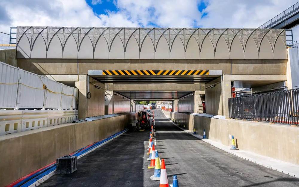 Why does it cost £237 million to build a railway bridge?
